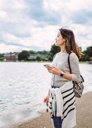 Woman looking at a lake