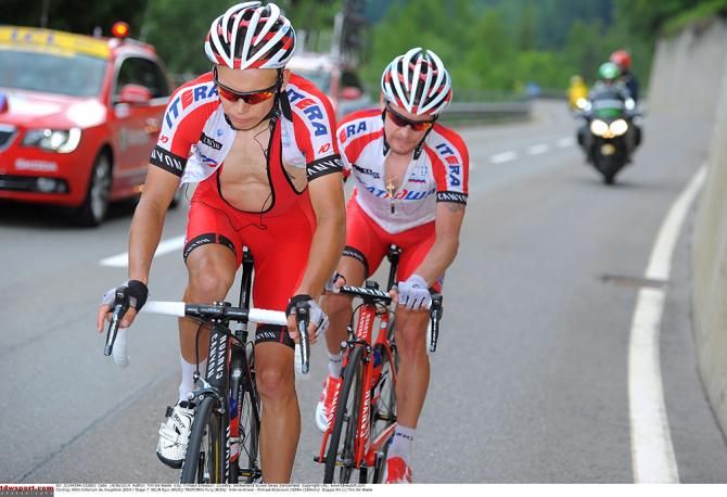 Katush teammates Yury Trofimov and Egon Silin hold on for second and third on the podium