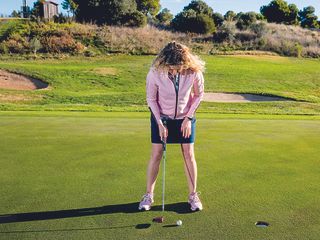 Golf Monthly Top 50 Coach Katie Dawkins demonstrating correct putter set-up