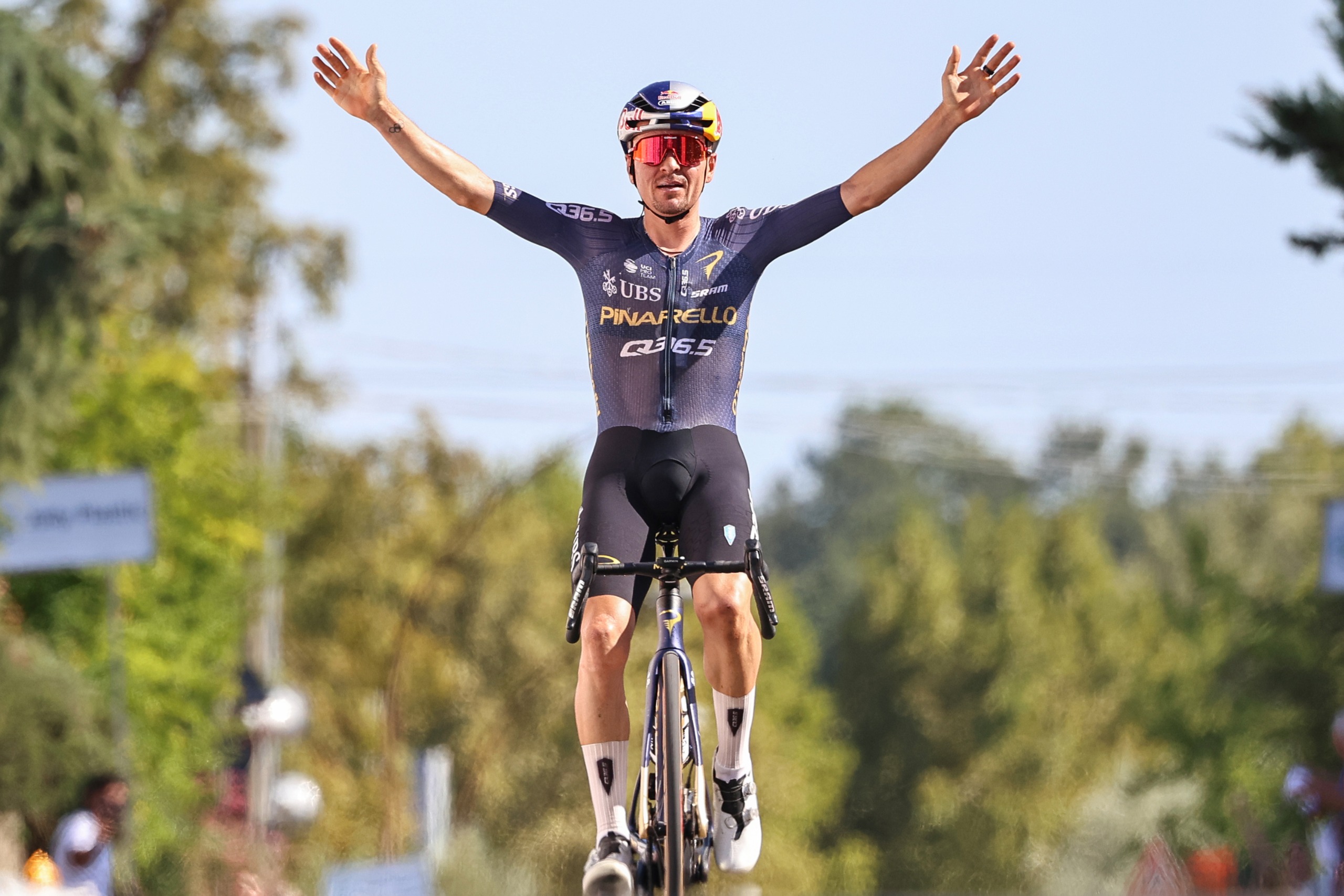 Tom Pidcock celebrating winning the GP Industria &amp;amp; Artigianato in a Pinarello Q36.5 kit