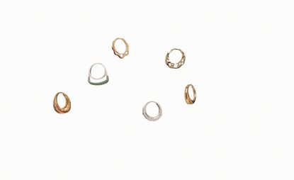 six rings against a white background