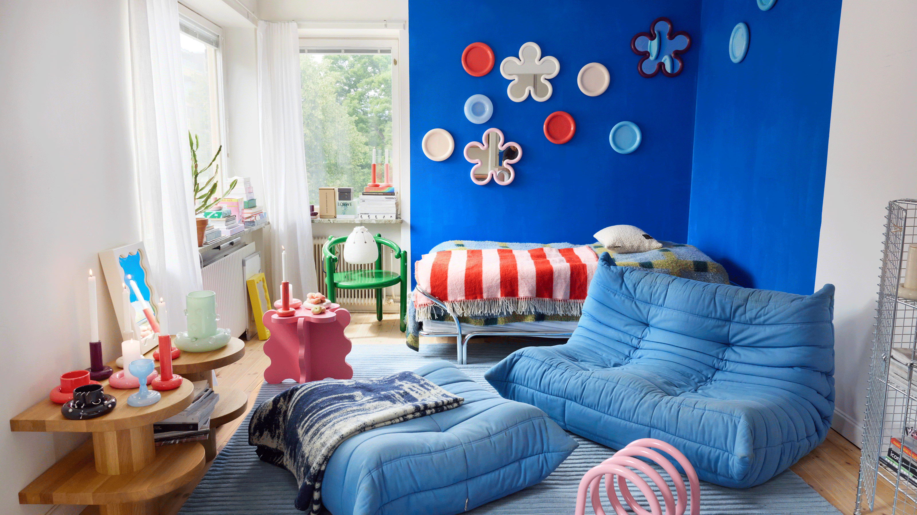Gustaf Westman studio apartment blue walls with mirror decor 