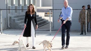 Kate Middleton, Prince William with two blonde Labradors