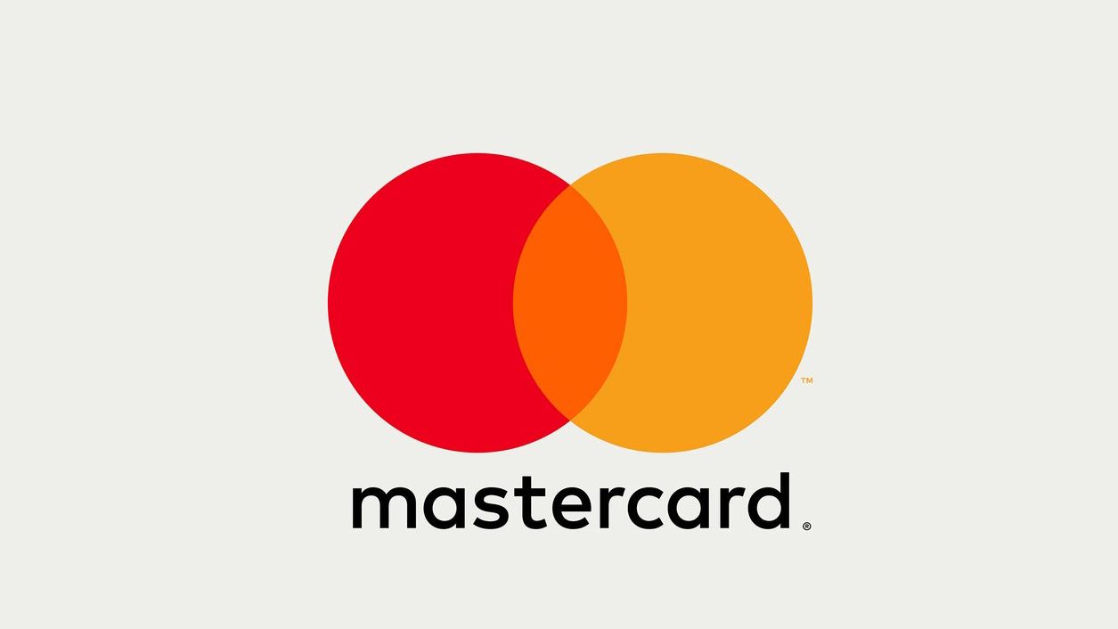 Pentagram's initial Mastercard redesign in 2016 removed the stripes of old, favouring solid blocks of colour and the company name beneath the logo instead of across the centre