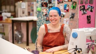 Catherine in a brown pinafore for The Great British Sewing Bee 2023