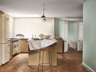 Neutral wooden kitchen painted in Timeless, the best white paint for kitchens