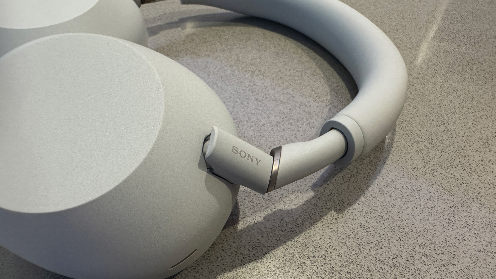 Close up of the hinge of the Sony WH-1000XM6 headphones