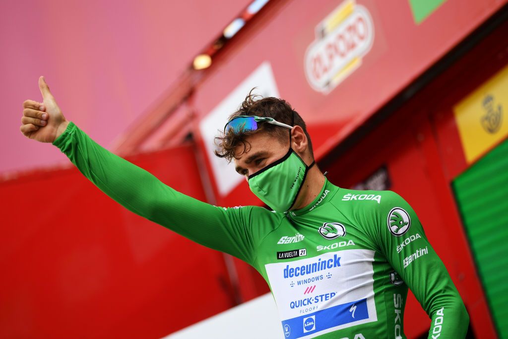 RINCON DE LA VICTORIA SPAIN AUGUST 24 Fabio Jakobsen of Netherlands and Team Deceuninck QuickStep celebrates winning the Green Points Jersey on the podium ceremony after the 76th Tour of Spain 2021 Stage 10 a 189km stage from Roquetas de Mar to Rincn de la Victoria lavuelta LaVuelta21 on August 24 2021 in Rincon De La Victoria Spain Photo by Tim de WaeleGetty Images