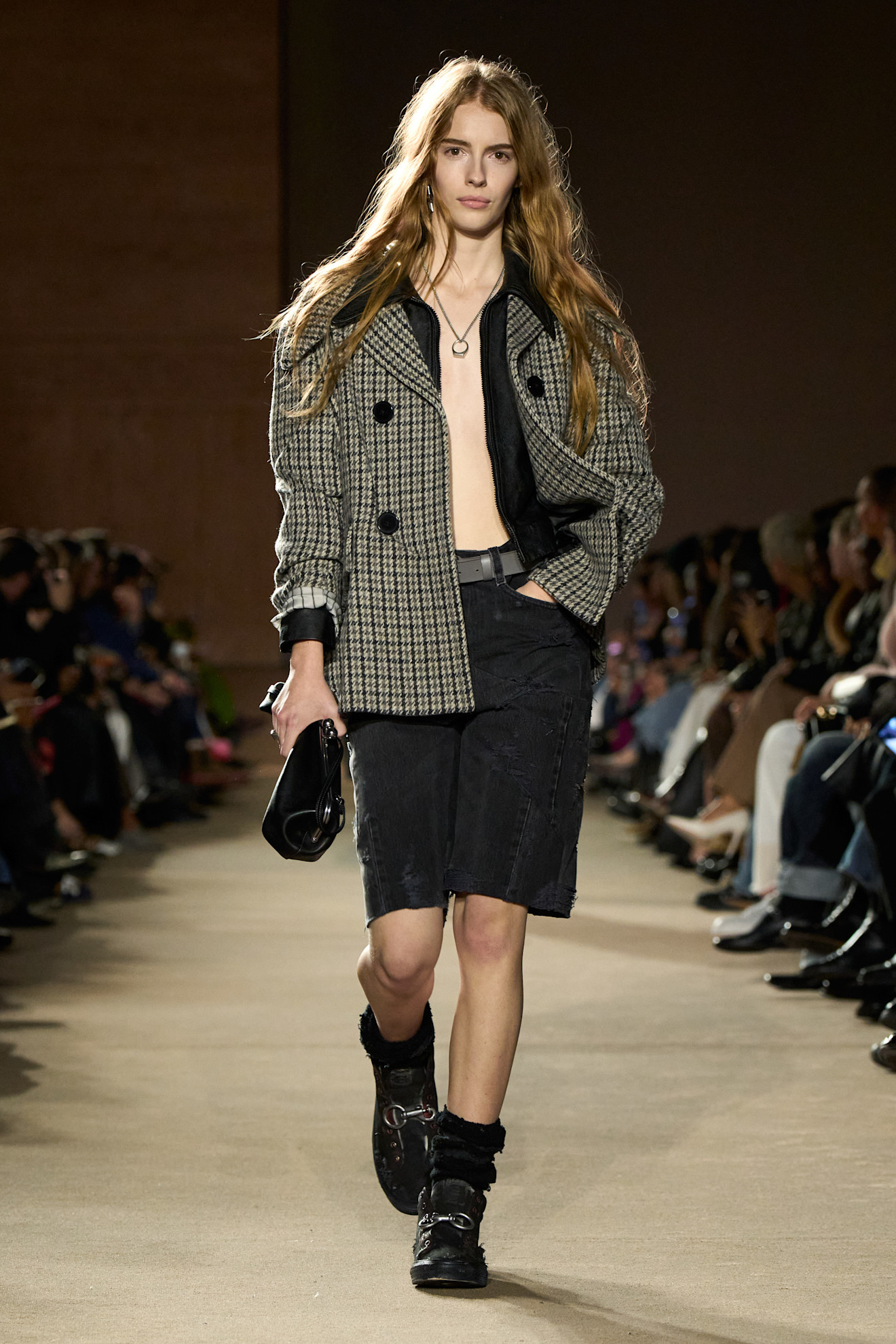 A model wore the Bermuda shorts trend on Coach's Fall 2026 runway