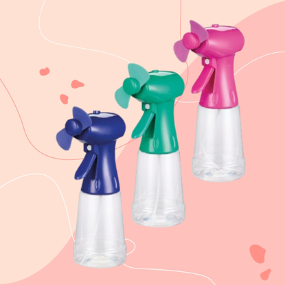 Three Aldi misting fans on pink background