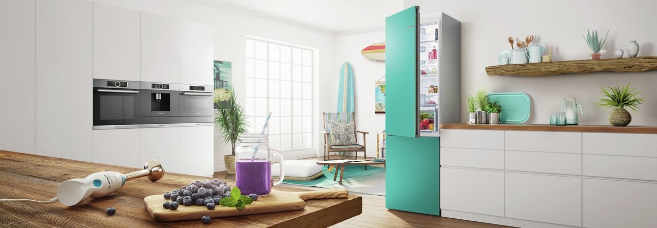 coloured fridge in a white kitchen