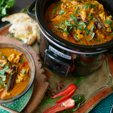 Close-up of crock-pot filled with chicken curry