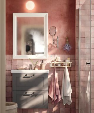 IKEA bathroom elevated with pink wall tiles and pink plaster effect paint