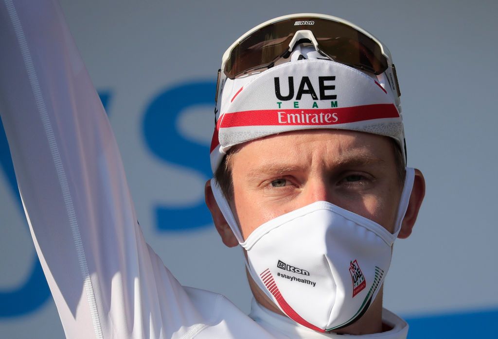 Stage winner Team UAE Emirates rider Slovenias Tadej Pogacar celebrates on the podium after winning the 15th stage of the 107th edition of the Tour de France cycling race 175 km between Lyon and Grand Colombier on September 13 2020 Photo by Christophe Petit Tesson POOL AFP Photo by CHRISTOPHE PETIT TESSONPOOLAFP via Getty Images