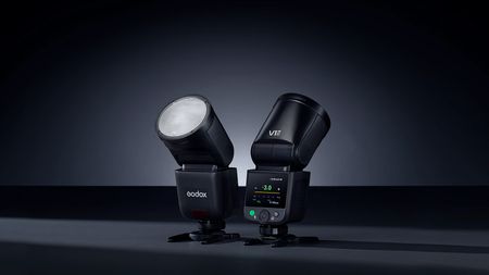 An external camera flash system on display. 
