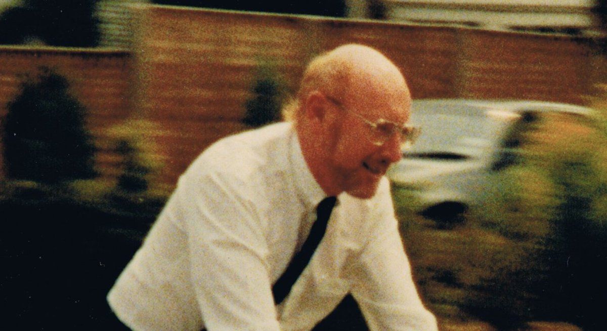 Sir Clive Sinclair riding an electric bike