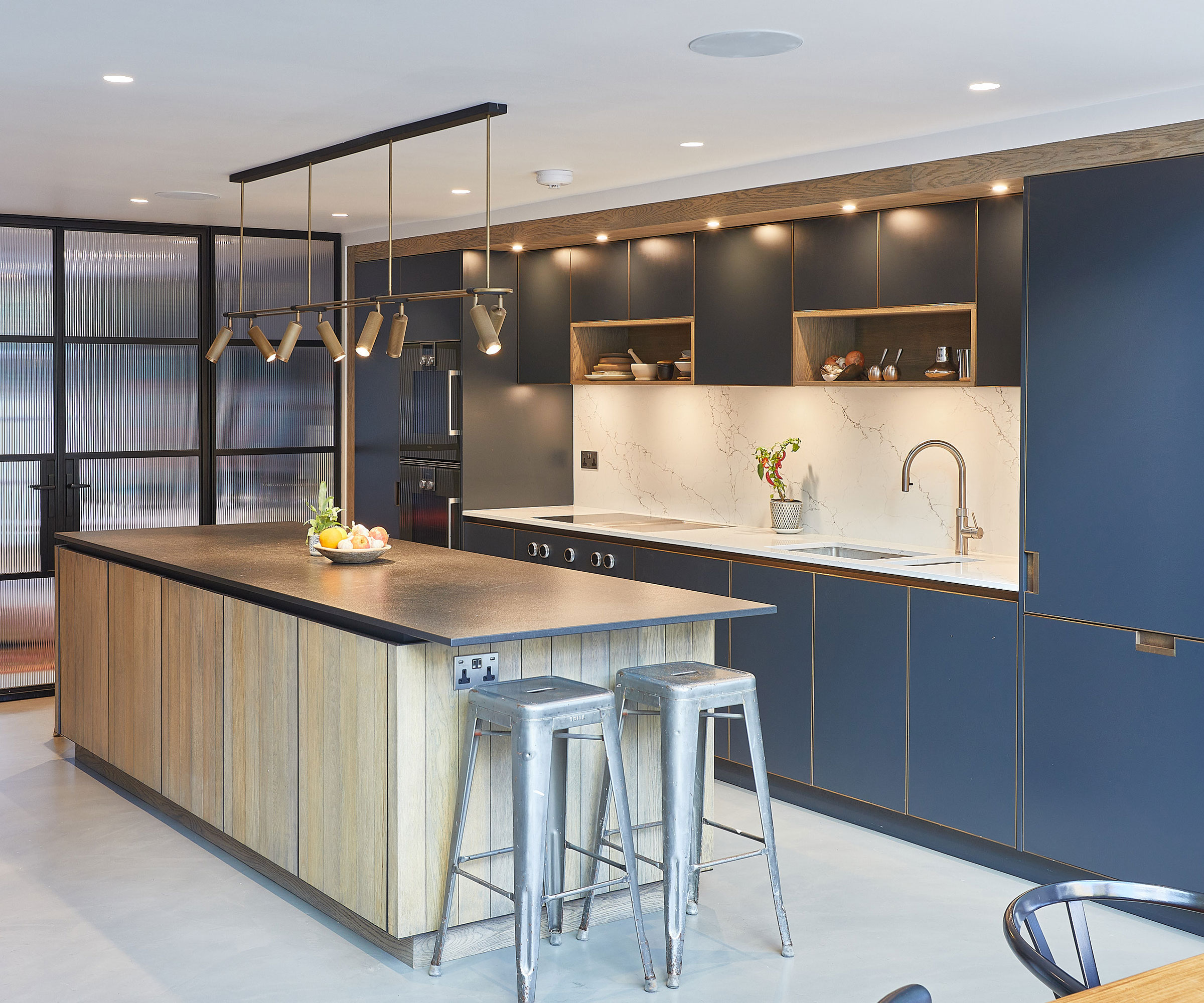 blue kitchen with wooden kitchen island