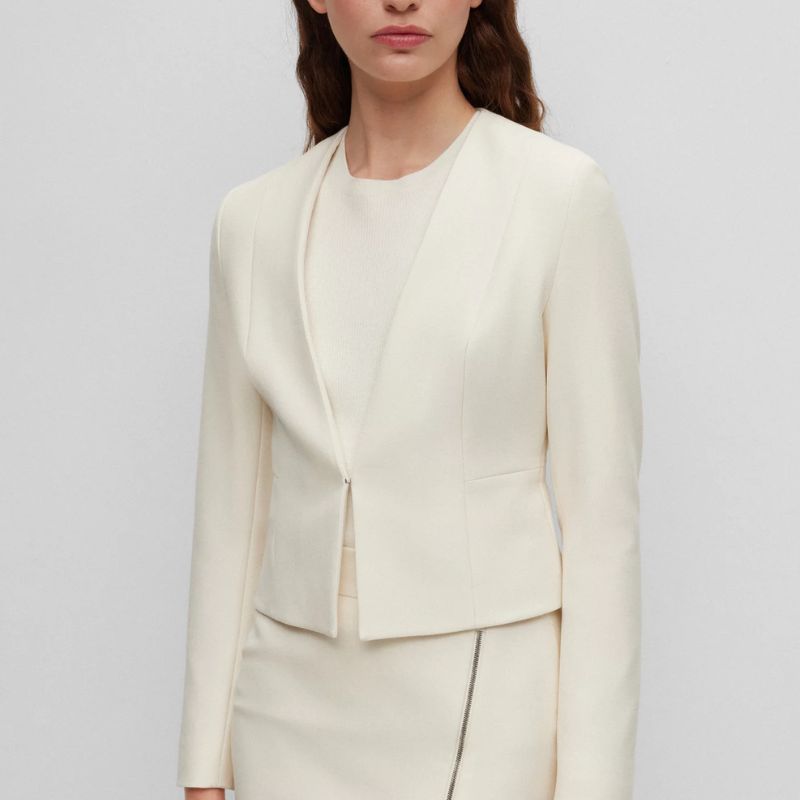 white cropped collarless blazer