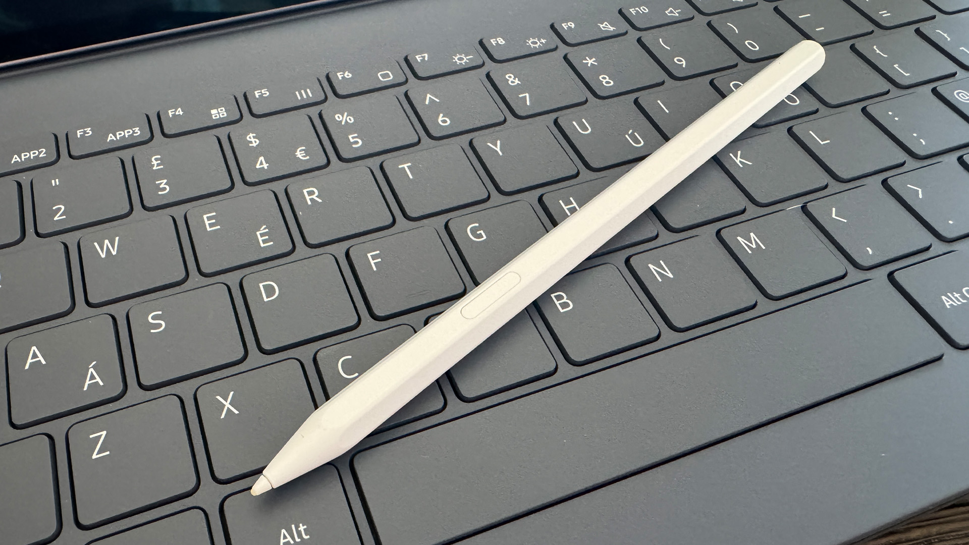Samsung Galaxy Tab S11 Ultra tablet keyboard with S-pen lying across it