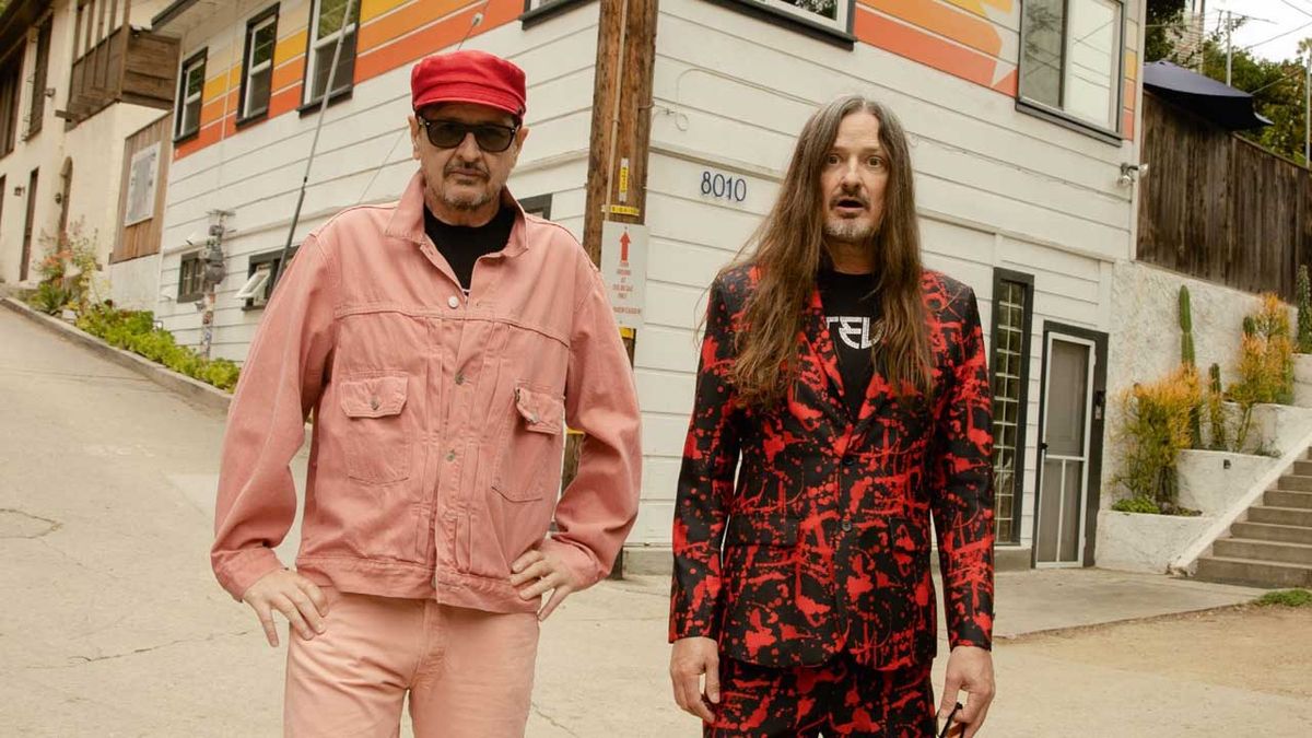 Redd Kross standing in the street