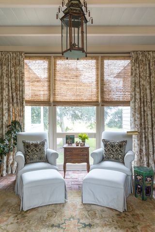 sunroom with two armchairs