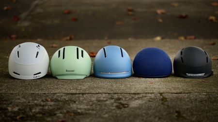 group image of the best commuter bike helmets in an urban environment