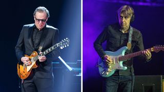 On the left, Joe Bonamassa plays a Gibson Les Paul Standard, while Eric Johnson plays a Daphne Blue Fender Strat on the right.