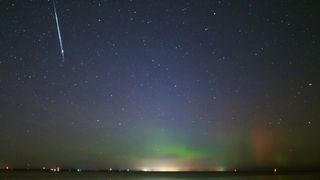 A streak of white light from a meteor graces the top left image of a blue and green starry night sky