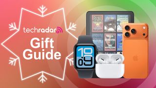 Apple Watch SE 3, AirPods Pro, iPhone 17 Pro Max, and Kindle Colorsoft on orange background with TechRadar gift guide text overlay
