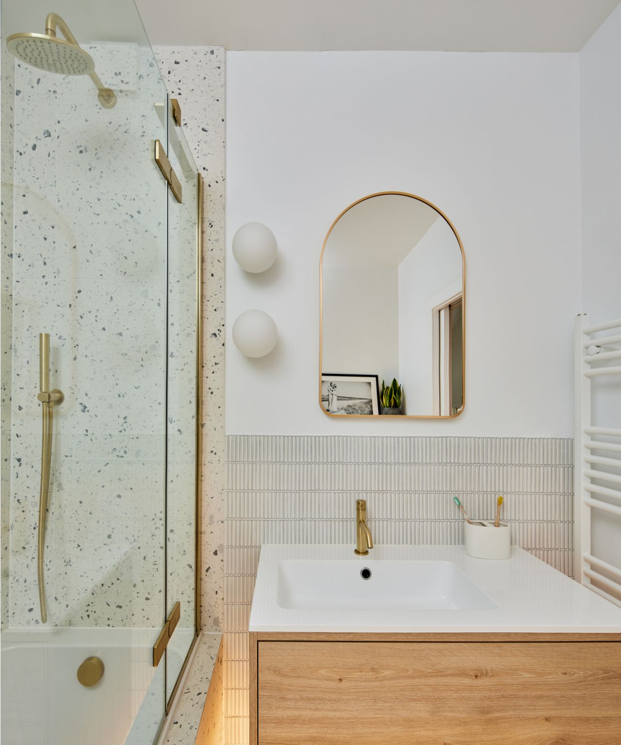 bathroom with wooden vanity unit, glass shower screen and fittings