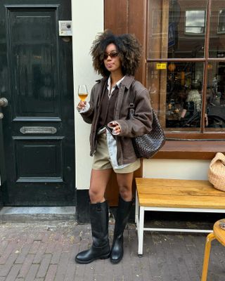 Amaka Hamelijnck wearing riding boots