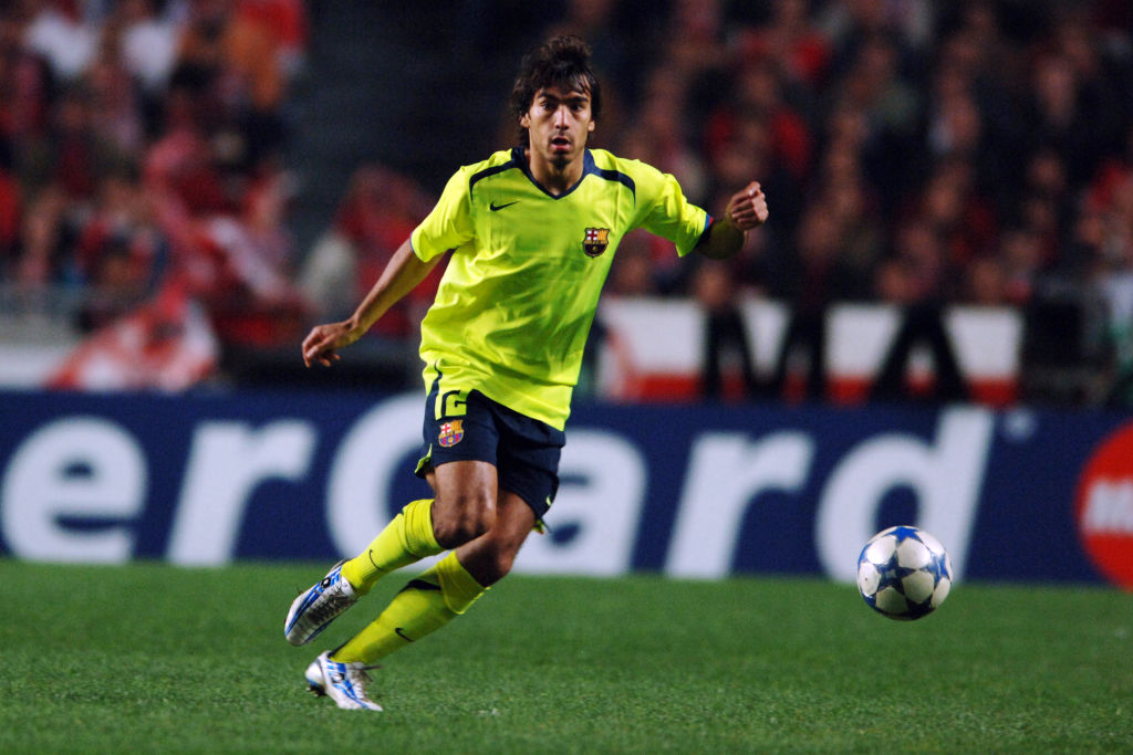 Giovanni van Bronckhorst of Barcelona in action during the UEFA Champions League Quarter-final first leg match between Benfica and Barcelona at the Estadio da Luz on March 28, 2006 in Lisbon, Portugal.