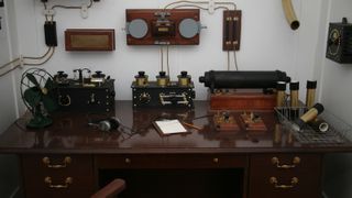 The wireless telegraph machine, shown here in a replica of the Titanic's Marconi Room, was used to send frantic distress messages after the ship hit an iceberg in the North Atlantic and started to sink.