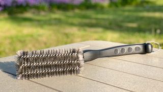 Kona 360 Clean Grill Brush on a table