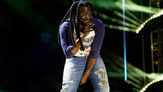 Shaboozey performs during CMA Fest 2025 ahead of his set at Glastonbury 2025