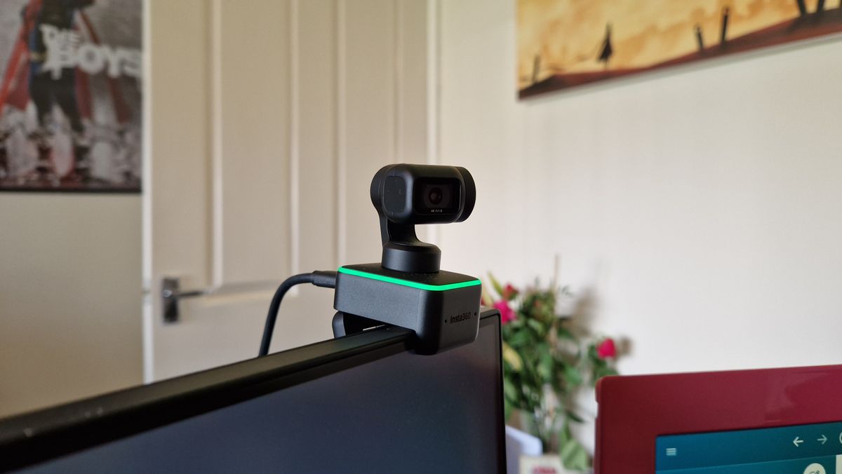 Insta360 Link sitting on a monitor from the side