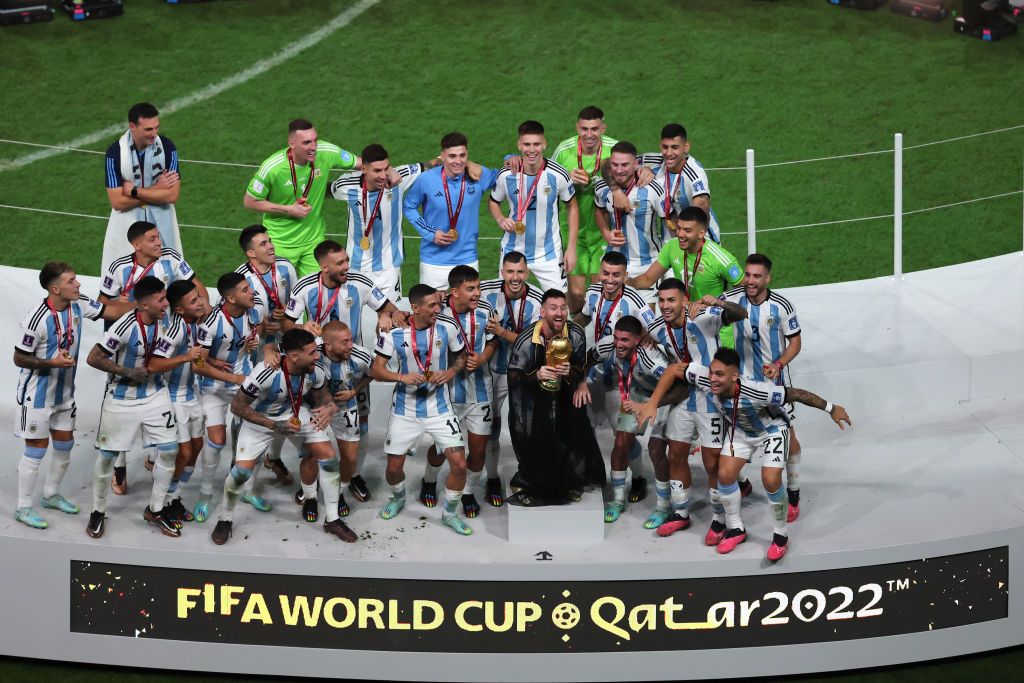 Alejandro Gomez of Argentina walks past the The FIFA World Cup Qatar 2022 Winner&#039;s Trophy after the team&#039;s victory during the FIFA World Cup Qatar 2022 Final match between Argentina and France at Lusail Stadium on December 18, 2022 in Lusail City, Qatar. (Photo by Clive Brunskill/Getty Images)