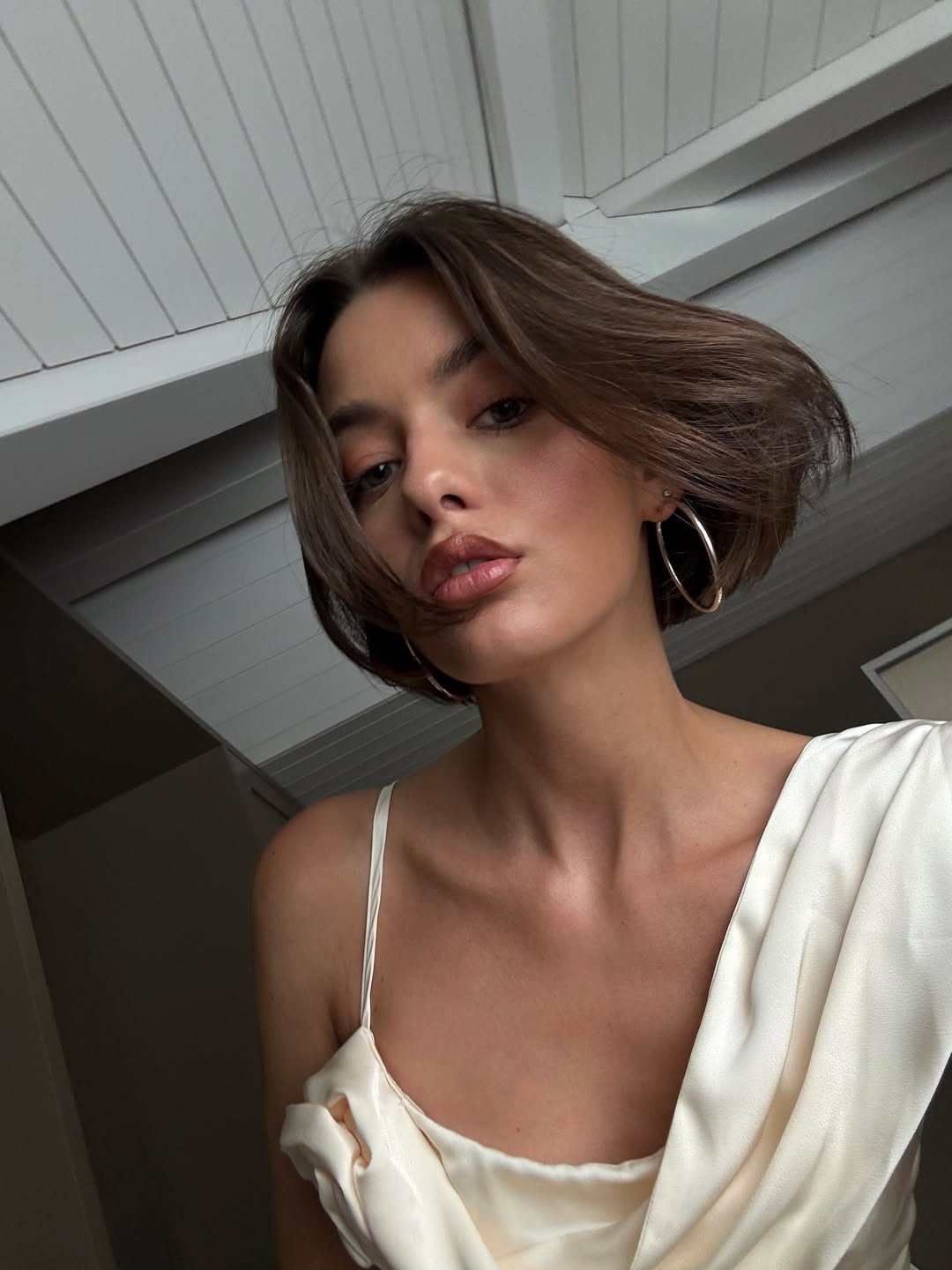 Mary L. Jean poses with a shiny, coiffed bob