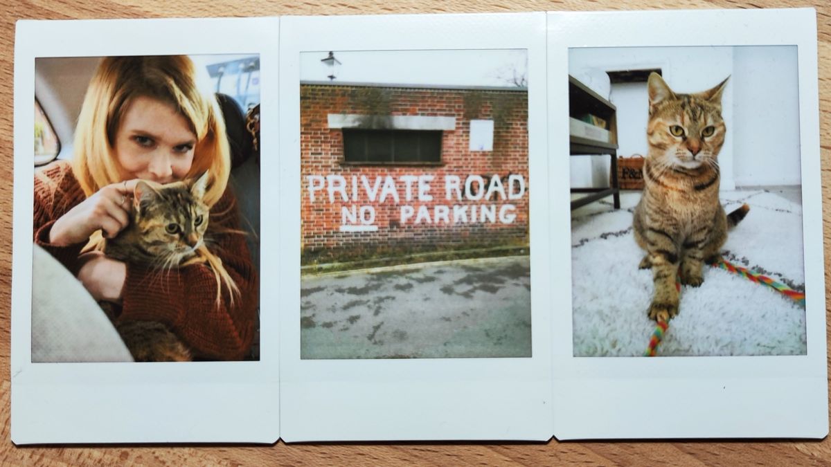 Instant photos on a wooden table