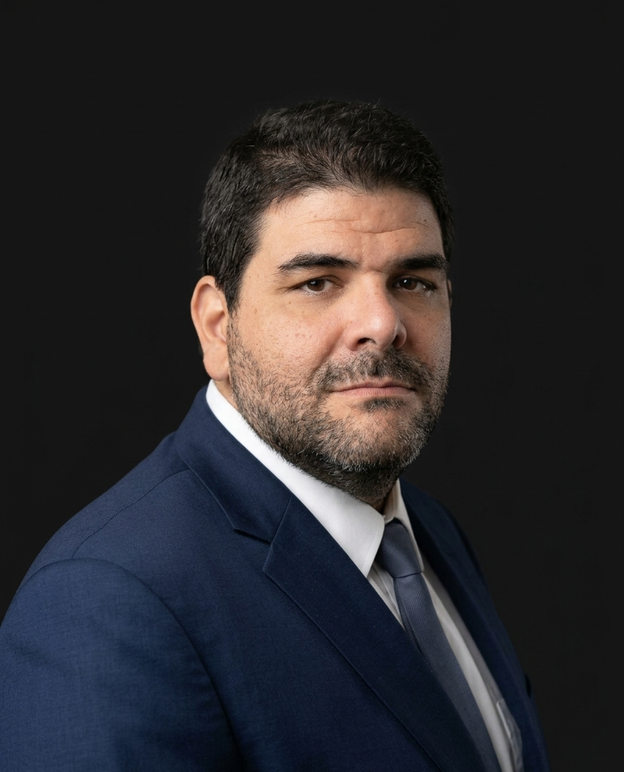 Headshot of Eran Binyamin Zeitoun.