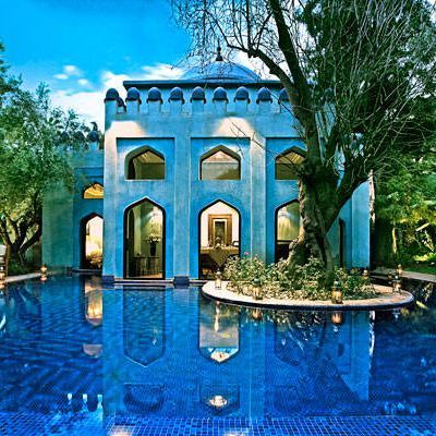Reflection, Arch, Water feature, Majorelle blue, Swimming pool, Garden, Reflecting pool, Tourist attraction, Landscaping, Resort town, 