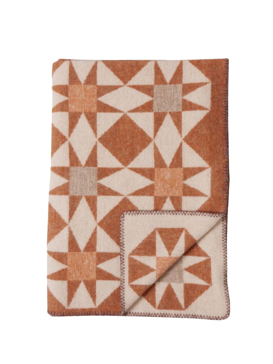 Orange and cream throw blanket