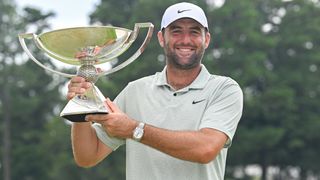 Scottie Scheffler with the FedEx Cup trophy