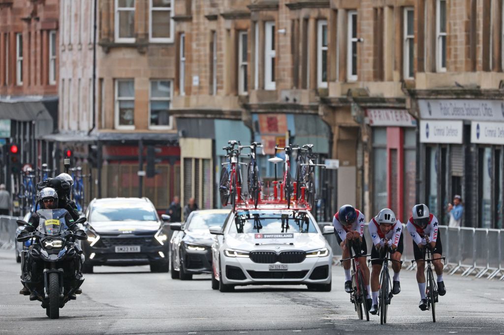 Riders from Canada take part in the Team Time Trial Mixed Relay road race during the UCI Cycling World Championships in Glasgow Scotland on August 8 2023 Photo by Adrian DENNIS AFP Photo by ADRIAN DENNISAFP via Getty Images