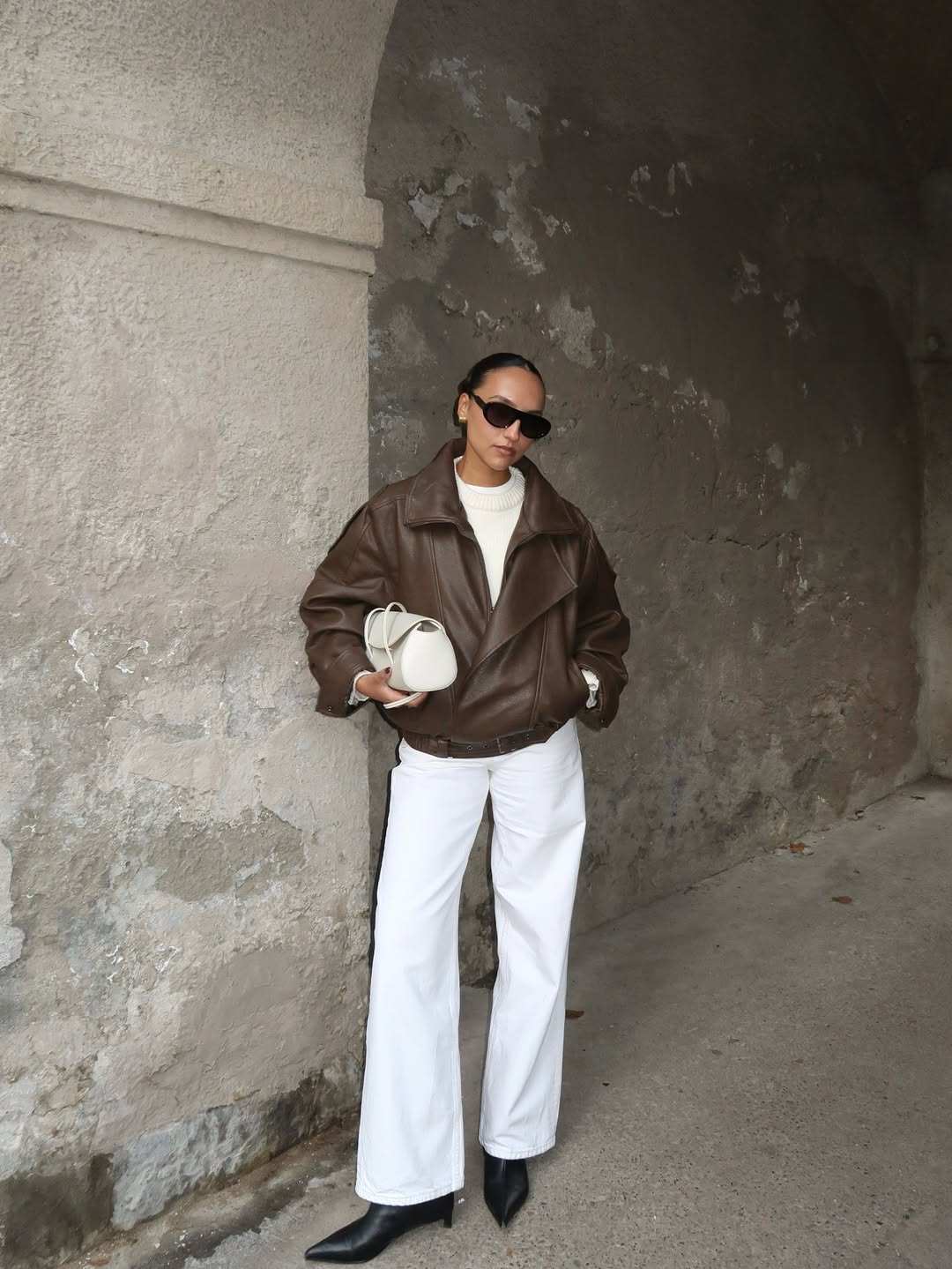 Ingrid wearing white jeans