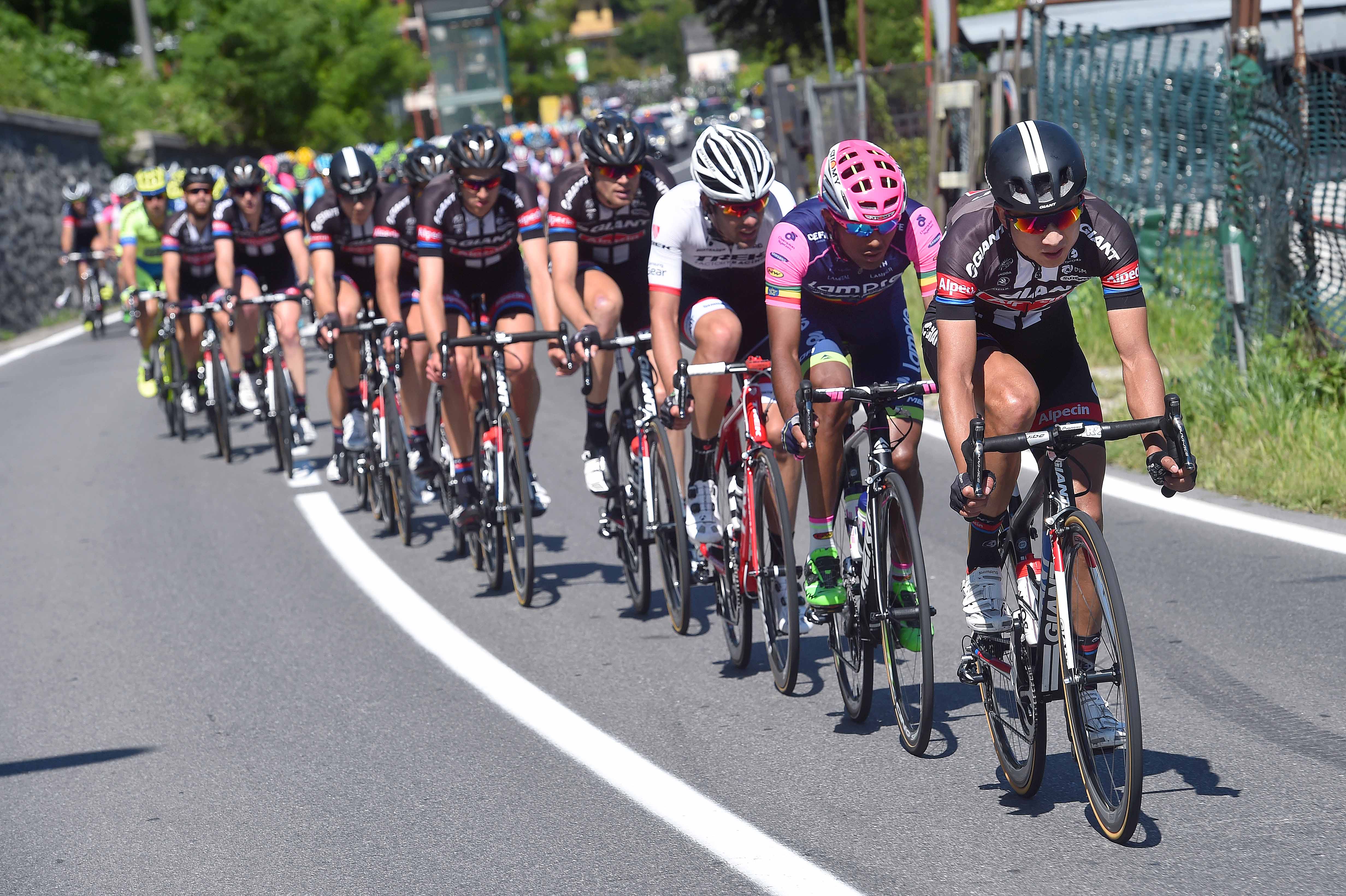 Ji Cheng and Tsgabu Grmay driving the pace on the front of the peloton