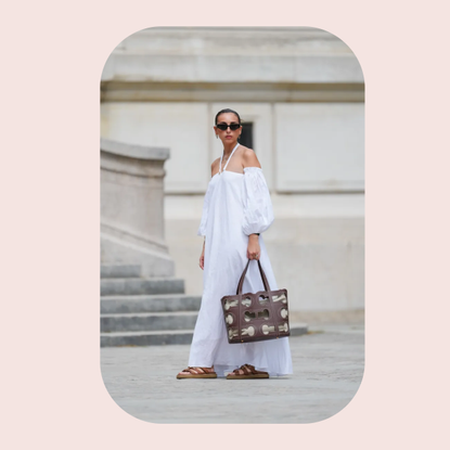 woman wearing a white long linen dress 
