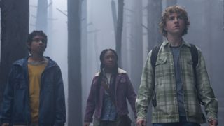 Grover (Aryan Simhadri), Annabeth (Leah Sava Jeffries) and Percy (Walker Scobell) in the woods in Percy Jackson and The Olympians [L-R].