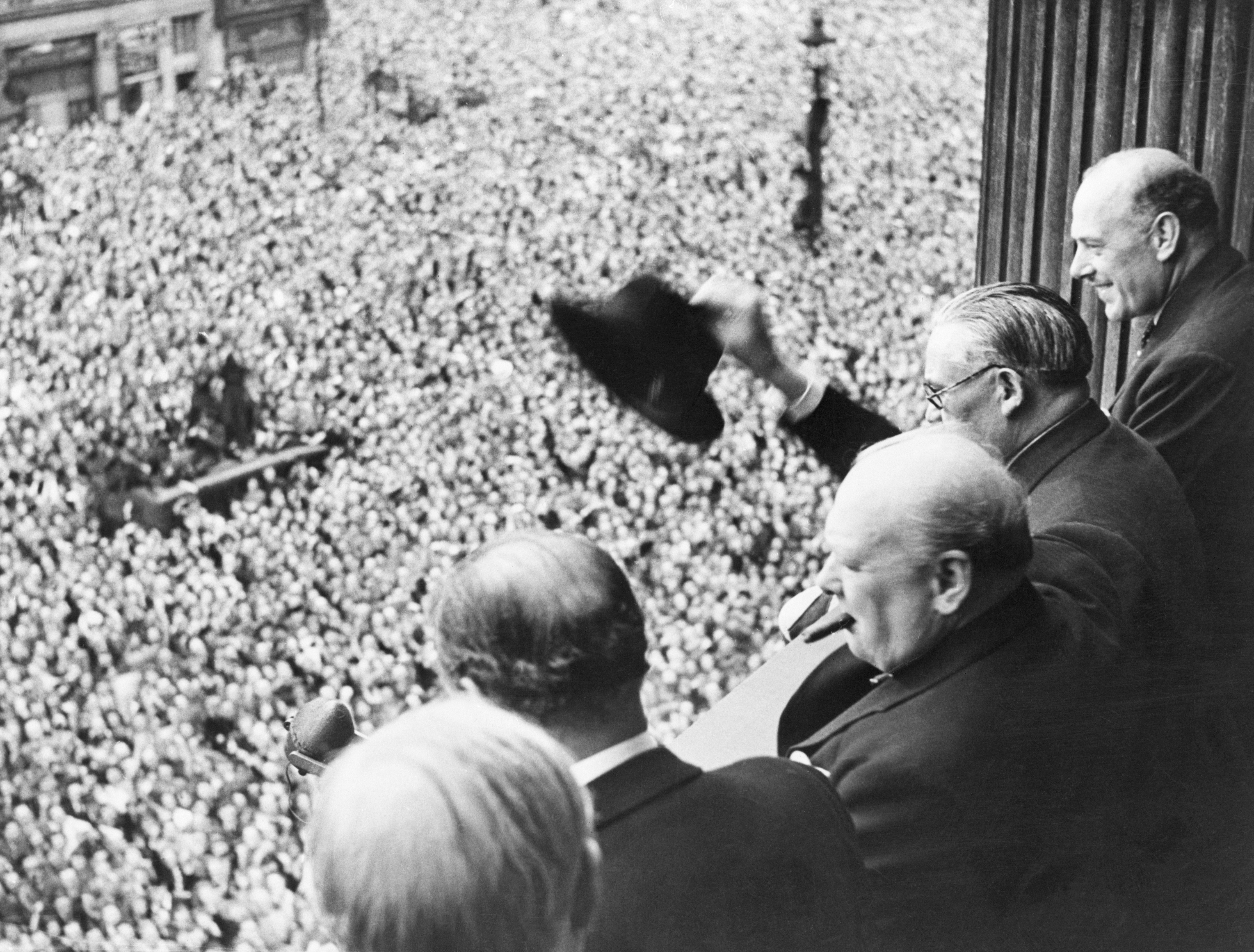 From a balcony in the Ministry of Health Building in Whitehall, Mr. Churchill addresses a huge crowd, 8th May 1945