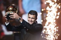 Manchester City's Spanish midfielder Rodri receives the Ballon d'Or award during the 2024 Ballon d'Or France Football award ceremony at the Theatre du Chatelet in Paris on October 28, 2024. 